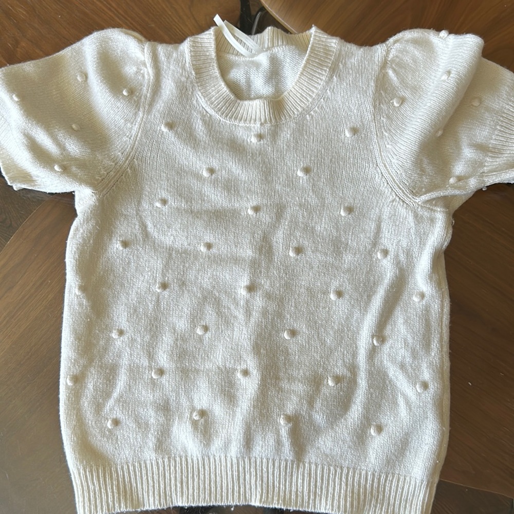 Gorgeous Anthropologie sweater off white w/ embellishments.